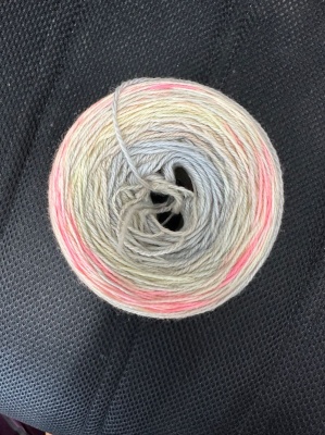 The skein wound, showing how the yarn was dyed with long color runs.