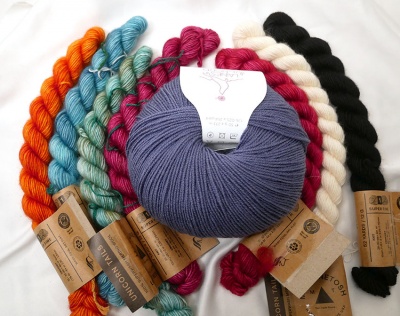 This is 1/3 of the kit -- there will be three balls of Dolly Baby and three skeins of each of the Unicorn Tails colors.