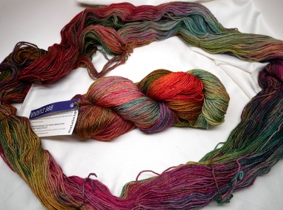 Diana, including one skein opened up so you can better see the sections of color within the colorway.