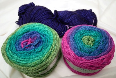 Kit A with Fuchsia (two balls shown, each wound from a different end; only one will be in each kit) + Purple Majesty.