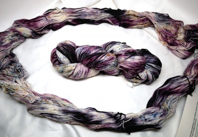 Ursula, again with a skein opened up to show the sections of colors.