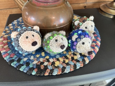 These photos show some of the designer's original hedgehogs.