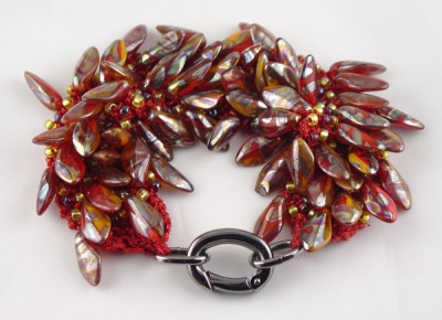 Another version of the same basic bracelet, this one we had called Flamenco Dancers.
